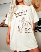 Load image into Gallery viewer, Women's Raisin' Hell Comfort Colors® Shirt, Trendy Western Cowboy T-Shirt, Garment Dyed T-Shirt, Bachelorette Party Shirt