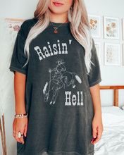Load image into Gallery viewer, Women's Raisin' Hell Comfort Colors® Shirt, Trendy Western Cowboy T-Shirt, Garment Dyed T-Shirt, Bachelorette Party Shirt
