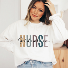 Load image into Gallery viewer, Pediatric Nurse Sweatshirt, Nurse Shirts, Graduation Gift, Nursing School, Nurses Week Appreciation, RN, Unisex Crewneck Sweatshirt