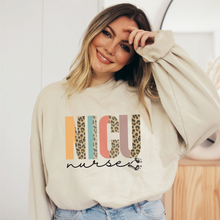 Load image into Gallery viewer, Women's NICU Nurse Crewneck Sweatshirt Winter Neonatal ICU on a Soft, Cozy Pullover Unisex-Size Sweatshirt in White, Sand, or Ash