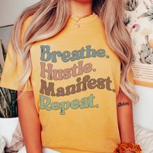 Load image into Gallery viewer, Breathe Hustle Manifest Repeat Tee, 70's Comfort Colors® T-shirt, Spring1970's Retro Design T-Shirt in Five Colors, Trendy Summer Seventies Tee