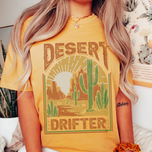 Load image into Gallery viewer, Desert Drifter Comfort Colors® Unisex Garment-Dyed T-shirt in Green, Yam, Mustard, White Distressed Desert Design