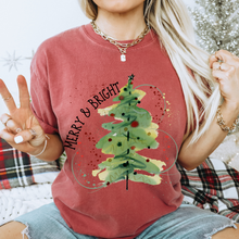 Load image into Gallery viewer, Comfort Colors® Christmas Merry and Bright T-shirt in Mustard, Crimson and White Christmas Watercolor Tree Soft Relaxed Fit Tee