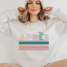 Load image into Gallery viewer, Apres-Ski Crewneck Sweatshirt APRES on a Soft, Cozy Pullover Unisex-Size Sweatshirt in White, Sand, or Ash