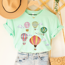 Load image into Gallery viewer, Watercolor Hot Air Balloons Women's T Shirt Soft Bella Canvas Spring Shirt Unisex Pastel Balloons Shirt Hot Air Ballon Festival Shirt