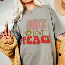Load image into Gallery viewer, Retro Comfort Colors® Christmas T-shirt, Women's Trendy Joy Love Peace T-Shirt in Grey, Mustard, Pepper, Yam, Crimson, White, Sage
