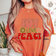 Load image into Gallery viewer, Retro Comfort Colors® Christmas T-shirt, Women's Trendy Joy Love Peace T-Shirt in Grey, Mustard, Pepper, Yam, Crimson, White, Sage