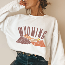 Load image into Gallery viewer, Women's Wyoming Mountains Crewneck Sweatshirt Distressed Wyoming Design in a Cozy, Warm Winter Adventure Camping Hiking Pullover