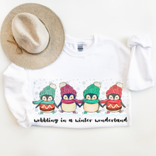 Load image into Gallery viewer, Waddling In A Winter Wonderland Cute Penguins Unisex-Size Winter Crewneck Sweatshirt Winter Pullover Winter Hand Drawn Penguins Gift