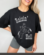 Load image into Gallery viewer, Women&#39;s Raisin&#39; Hell Comfort Colors® Shirt, Trendy Western Cowboy T-Shirt, Garment Dyed T-Shirt, Bachelorette Party Shirt
