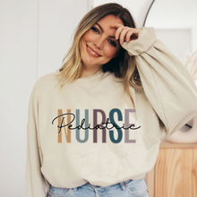 Load image into Gallery viewer, Pediatric Nurse Sweatshirt, Nurse Shirts, Graduation Gift, Nursing School, Nurses Week Appreciation, RN, Unisex Crewneck Sweatshirt
