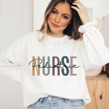 Load image into Gallery viewer, Pediatric Nurse Sweatshirt, Nurse Shirts, Graduation Gift, Nursing School, Nurses Week Appreciation, RN, Unisex Crewneck Sweatshirt
