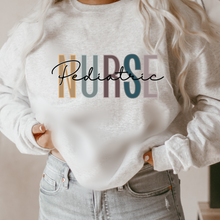 Load image into Gallery viewer, Pediatric Nurse Sweatshirt, Nurse Shirts, Graduation Gift, Nursing School, Nurses Week Appreciation, RN, Unisex Crewneck Sweatshirt
