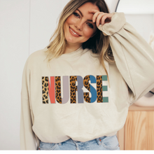 Load image into Gallery viewer, Nurse Sweatshirt, Nurse Shirts, Graduation Gift, Nursing School, Nurses Week Appreciation, RN, Unisex Crewneck Sweatshirt Leopard Letters
