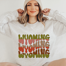 Load image into Gallery viewer, Women&#39;s Wyoming Crewneck Sweatshirt Winter Retro Wyoming Design on a Soft, Cozy Pullover Unisex-Size Sweatshirt
