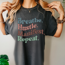 Load image into Gallery viewer, Breathe Hustle Manifest Repeat Tee, 70&#39;s Comfort Colors® T-shirt, Spring1970&#39;s Retro Design T-Shirt in Five Colors, Trendy Summer Seventies Tee
