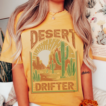 Load image into Gallery viewer, Desert Drifter Comfort Colors® Unisex Garment-Dyed T-shirt in Green, Yam, Mustard, White Distressed Desert Design
