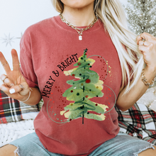 Load image into Gallery viewer, Comfort Colors® Christmas Merry and Bright T-shirt in Mustard, Crimson and White Christmas Watercolor Tree Soft Relaxed Fit Tee
