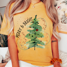 Load image into Gallery viewer, Comfort Colors® Christmas Merry and Bright T-shirt in Mustard, Crimson and White Christmas Watercolor Tree Soft Relaxed Fit Tee
