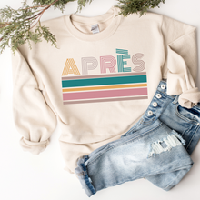 Load image into Gallery viewer, Apres-Ski Crewneck Sweatshirt APRES on a Soft, Cozy Pullover Unisex-Size Sweatshirt in White, Sand, or Ash
