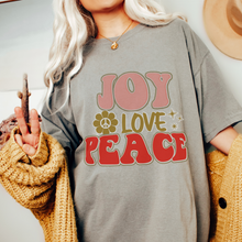 Load image into Gallery viewer, Retro Comfort Colors® Christmas T-shirt, Women&#39;s Trendy Joy Love Peace T-Shirt in Grey, Mustard, Pepper, Yam, Crimson, White, Sage
