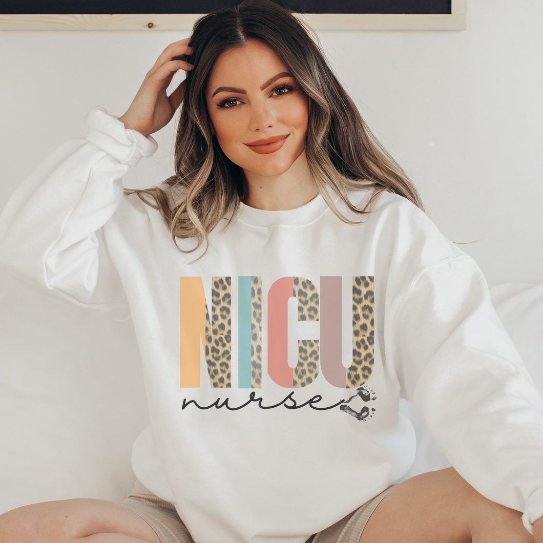 Women's NICU Nurse Crewneck Sweatshirt Winter Neonatal ICU on a Soft, Cozy Pullover Unisex-Size Sweatshirt in White, Sand, or Ash